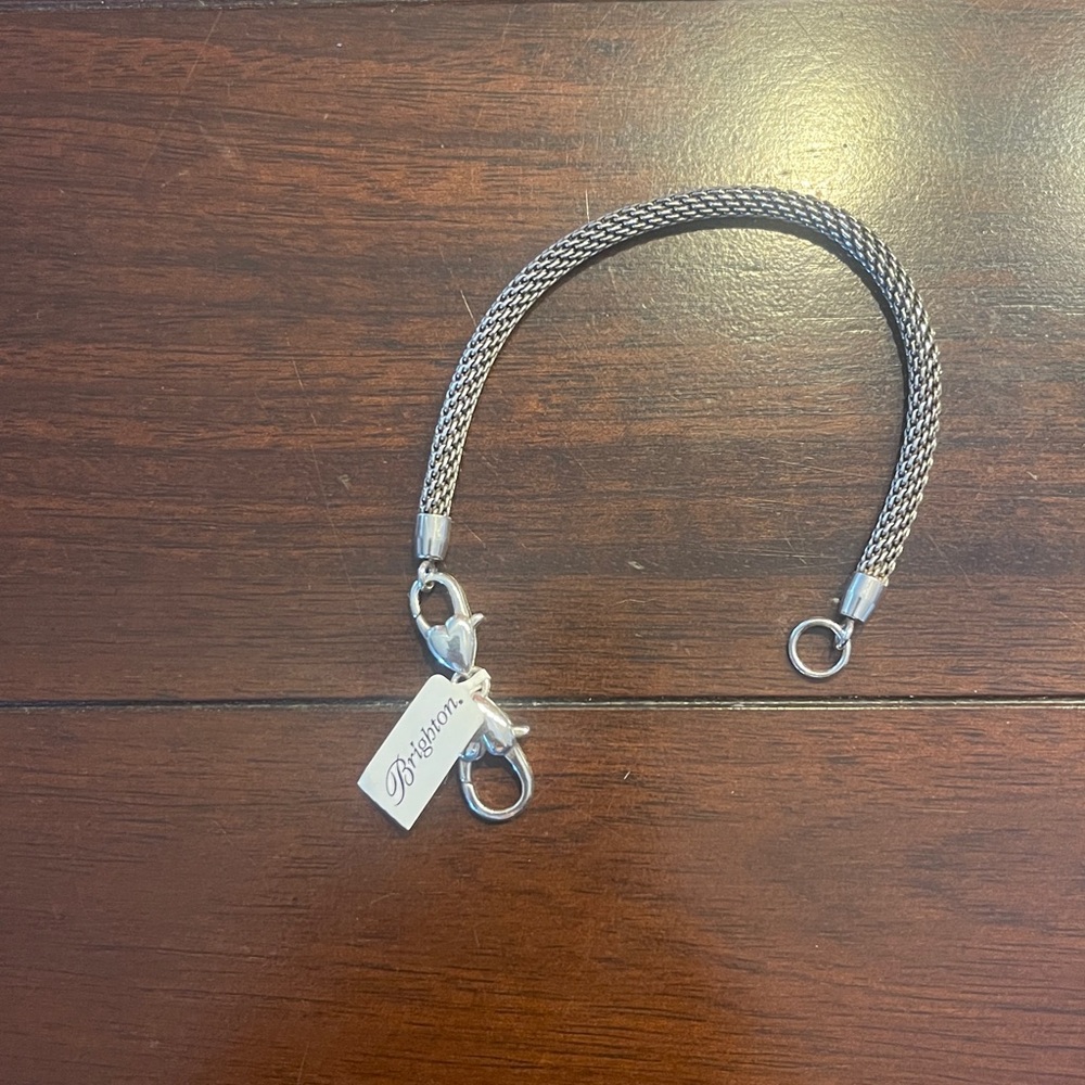 NWT Brand new, never worn Brighton Beverly Glam Silver charm bracelet. 8inches